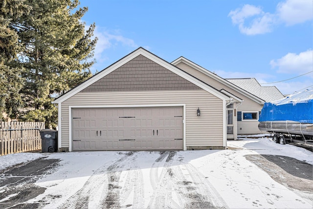 view of snow covered garage