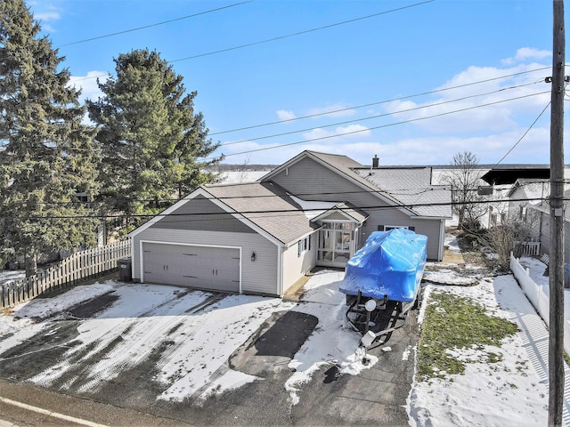 front of property with a garage