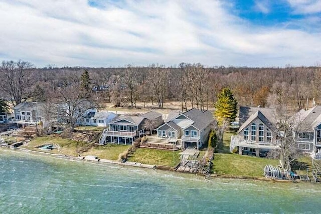 aerial view featuring a water view and a beach view