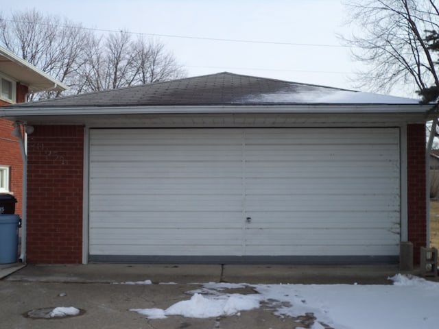 view of snow covered garage