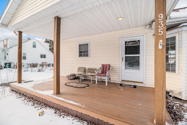 view of snow covered deck