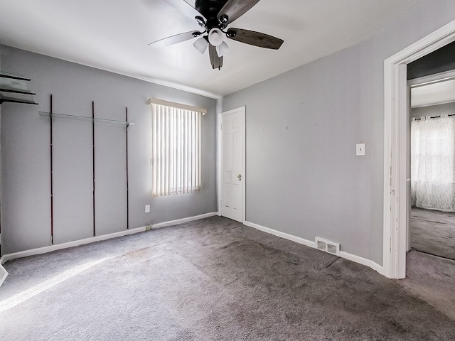 unfurnished bedroom with carpet flooring and ceiling fan