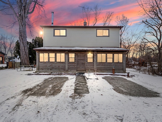 view of snow covered property