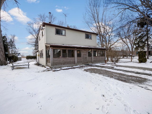 1397 N Channel Dr, Harsens Island, MI 48028 - view of snow covered rear of property