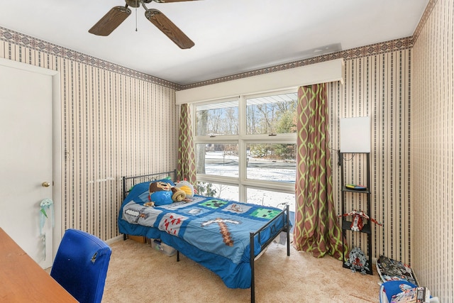 carpeted bedroom with ceiling fan