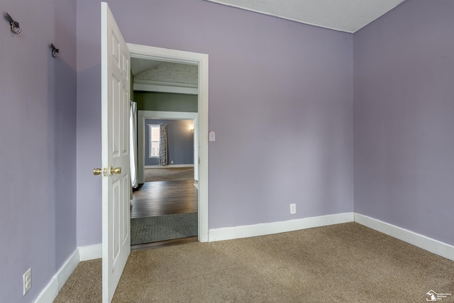 spare room with carpet floors