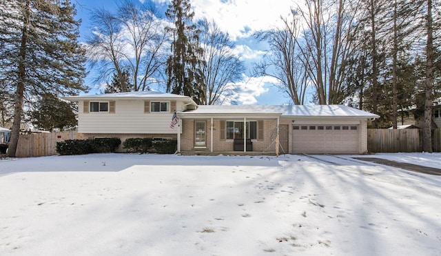 split level home with a garage