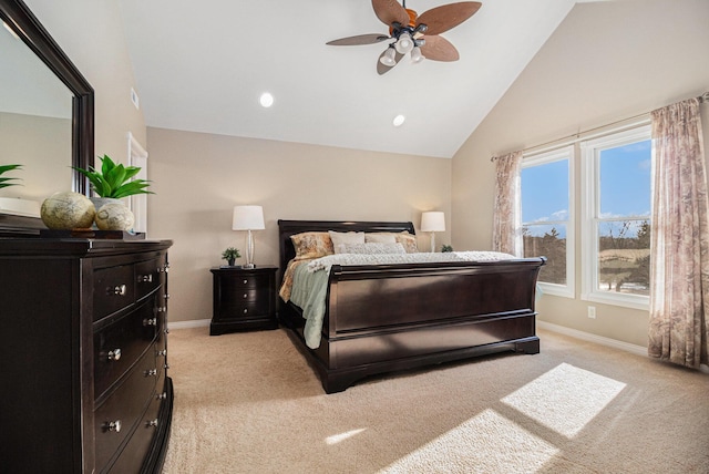 carpeted bedroom featuring lofted ceiling and ceiling fan