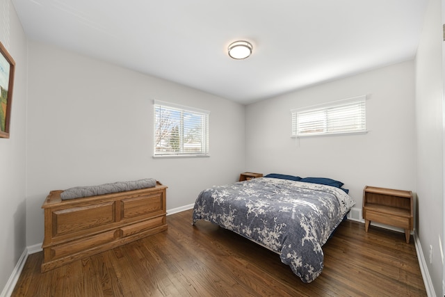 bedroom featuring dark hardwood / wood-style flooring