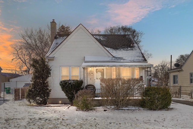 view of snow covered house