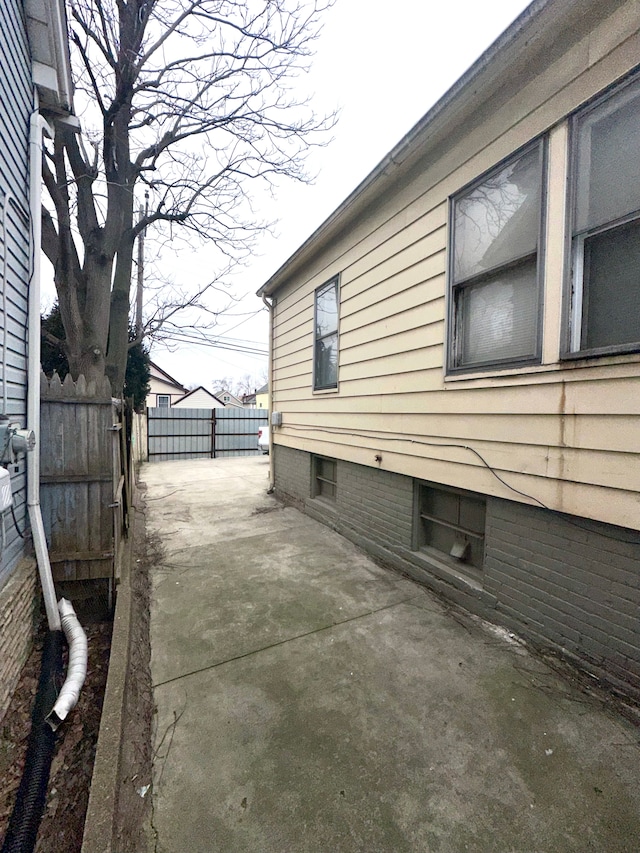 view of home's exterior with a patio