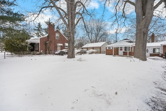 view of yard covered in snow