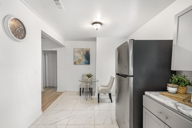 kitchen with stainless steel refrigerator