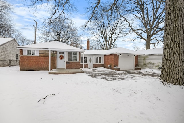 view of front of property featuring a garage