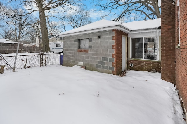 view of snow covered property