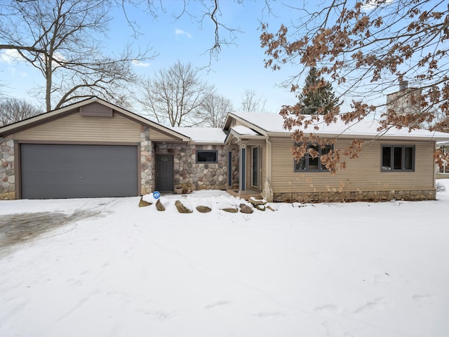 single story home featuring a garage