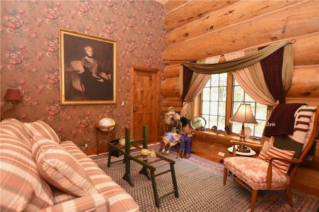 sitting room with log walls