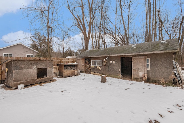 view of snow covered house