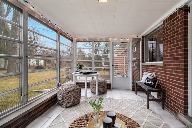 sunroom featuring plenty of natural light