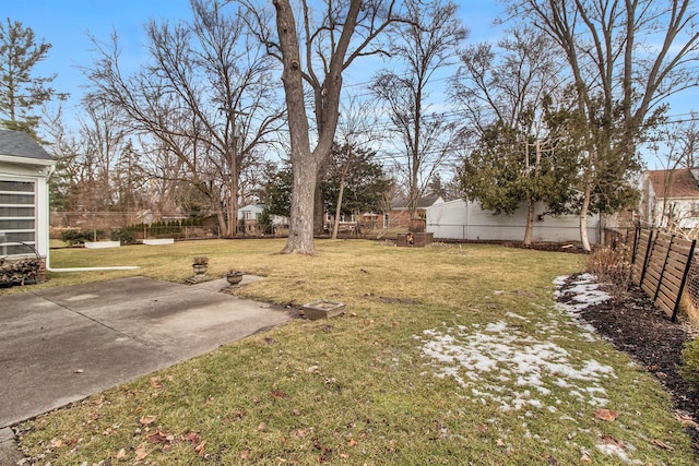 view of yard with a patio area and a fenced backyard