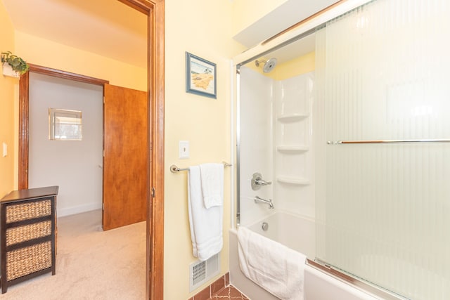 bathroom with enclosed tub / shower combo