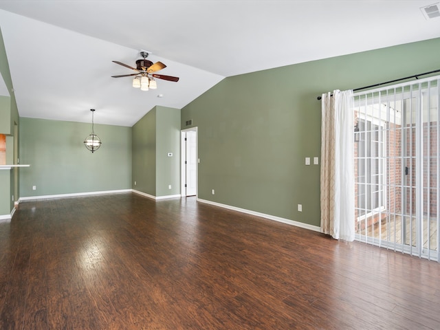 unfurnished living room featuring dark hardwood / wood-style flooring, ceiling fan, and vaulted ceiling