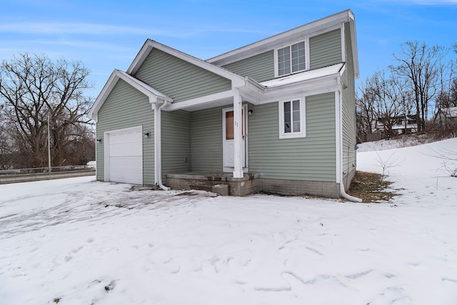 view of front of property featuring a garage