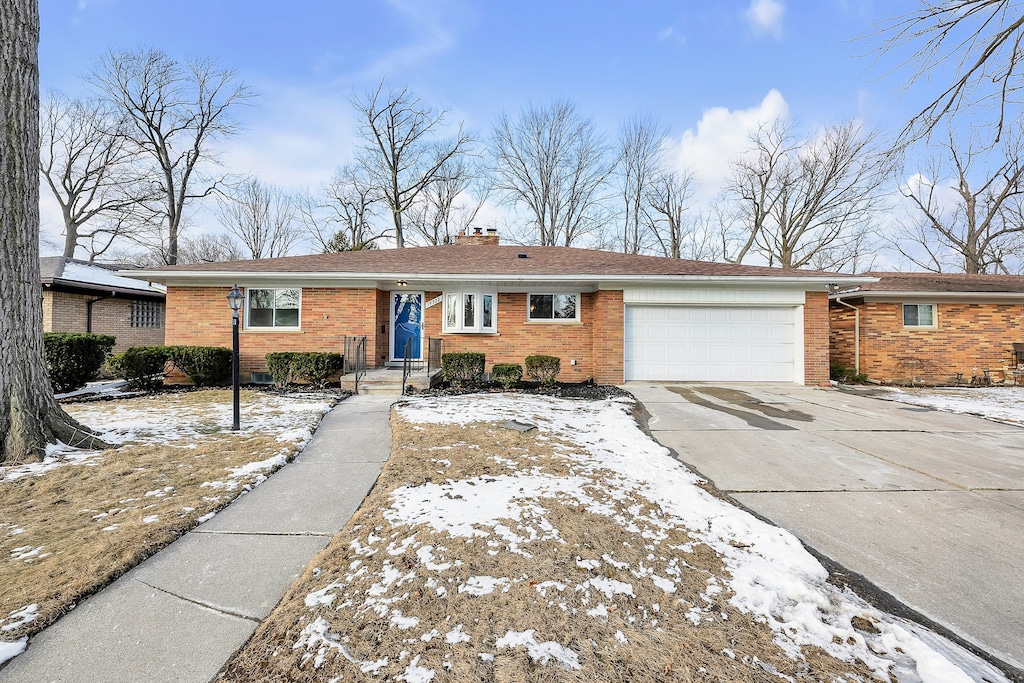 single story home featuring a garage