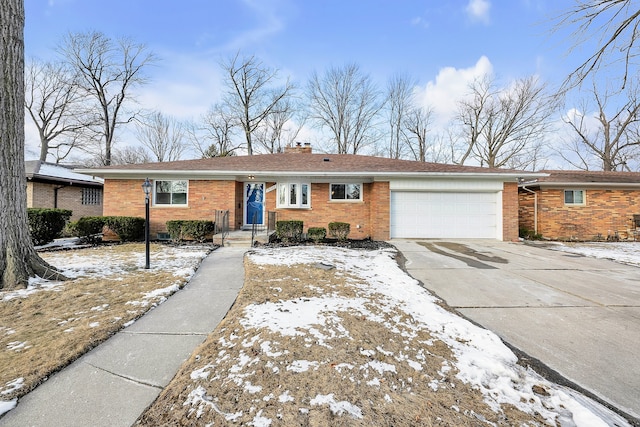 single story home featuring a garage