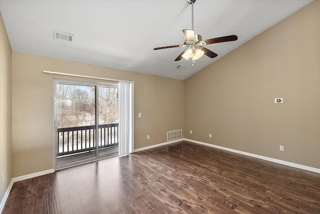 unfurnished room with dark wood-type flooring, vaulted ceiling, and ceiling fan