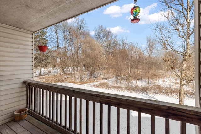 view of snow covered deck