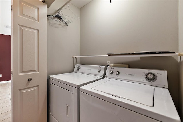 laundry area with washer and clothes dryer