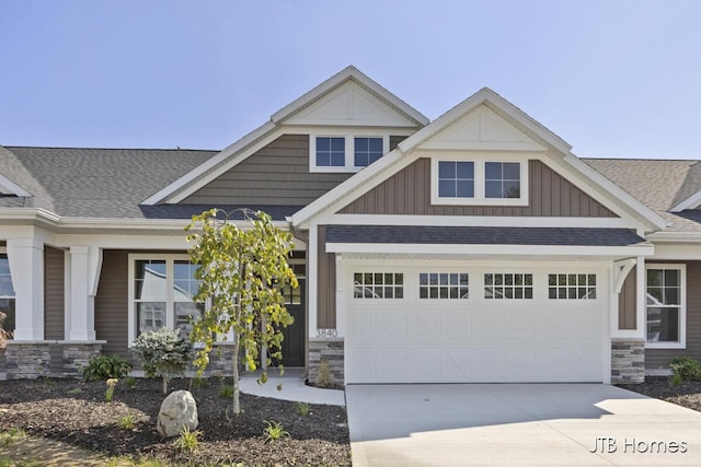 craftsman-style home featuring a garage