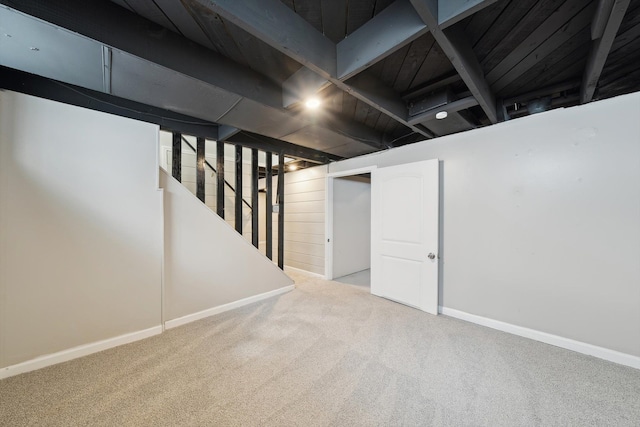 basement featuring carpet flooring