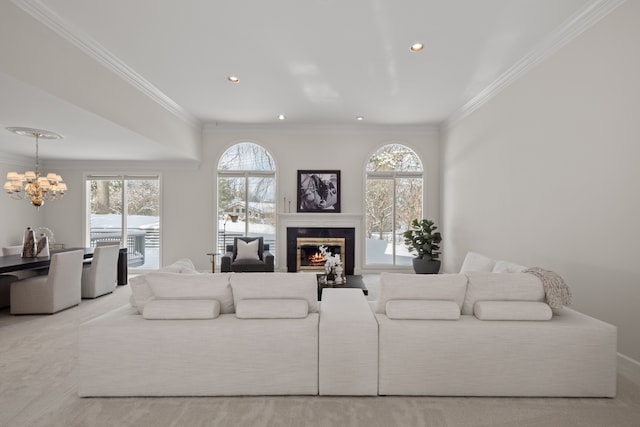 living room with crown molding, light carpet, and a notable chandelier