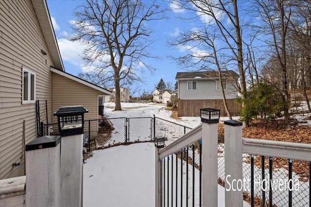 view of yard covered in snow