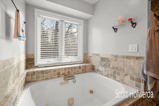 bathroom featuring tiled bath