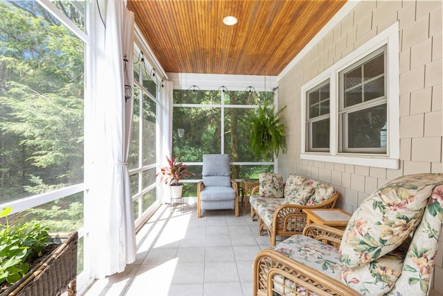 sunroom featuring wooden ceiling