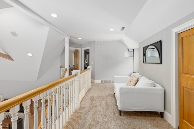 living area with light colored carpet