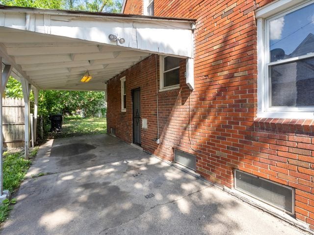 view of patio / terrace with a carport