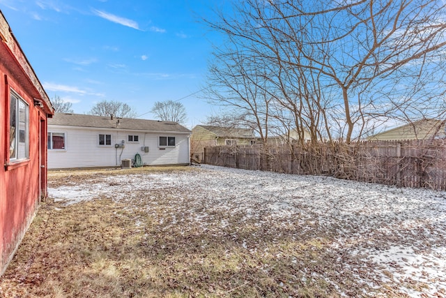 view of snow covered property