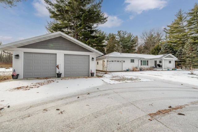 view of snow covered garage