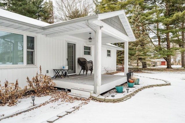 view of snow covered deck