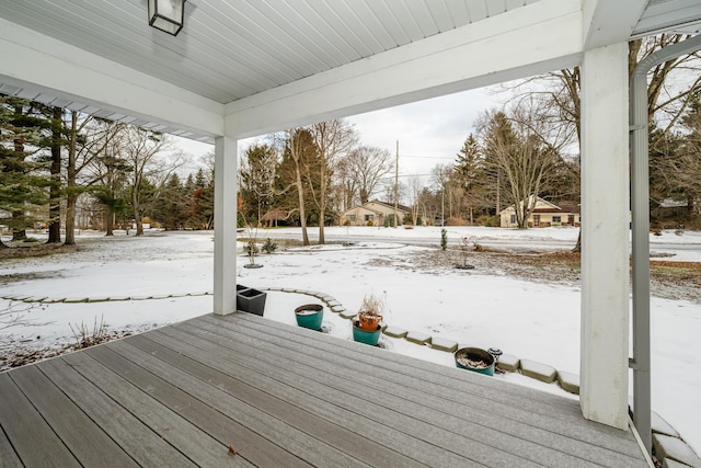 view of snow covered deck