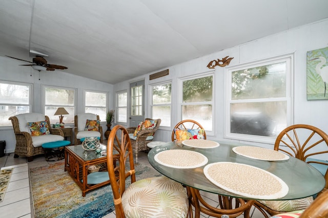 sunroom with vaulted ceiling and ceiling fan