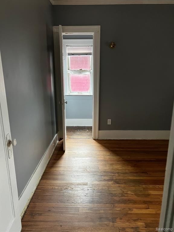 spare room featuring dark hardwood / wood-style floors