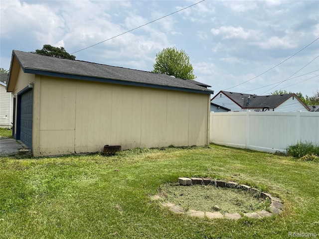 58785 Chennault Dr, New Haven, MI 48048 - view of side of home featuring a garage