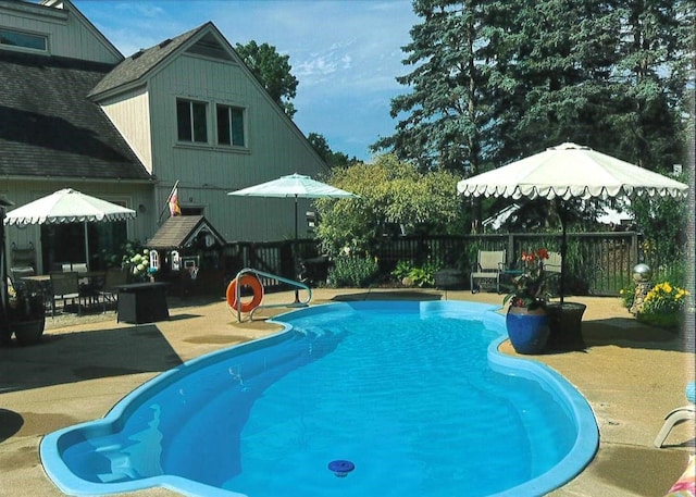 view of pool featuring a patio area