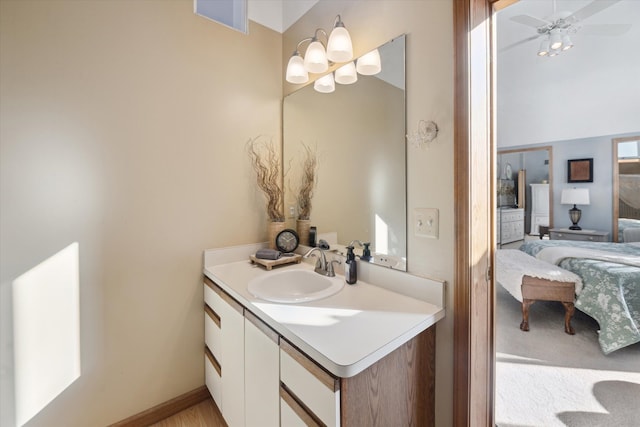 bathroom featuring ceiling fan and vanity