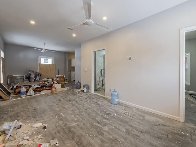 interior space with hardwood / wood-style flooring and ceiling fan